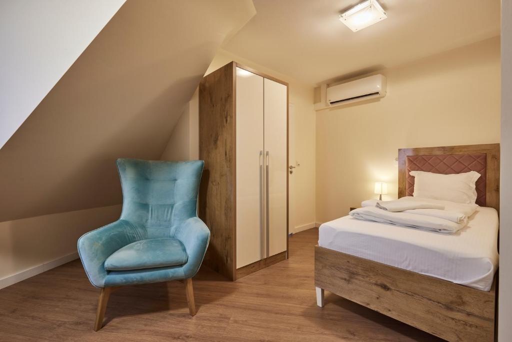 Postel nebo postele na pokoji v ubytování Hotel Isha
