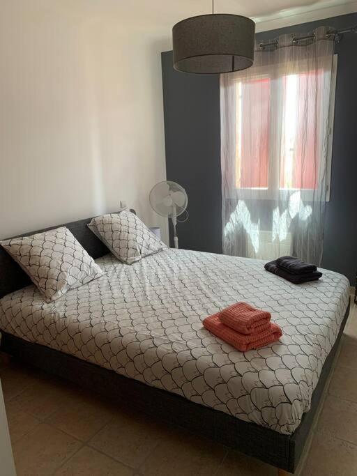 Posteľ alebo postele v izbe v ubytovaní Villa sud de la France avec piscine privée