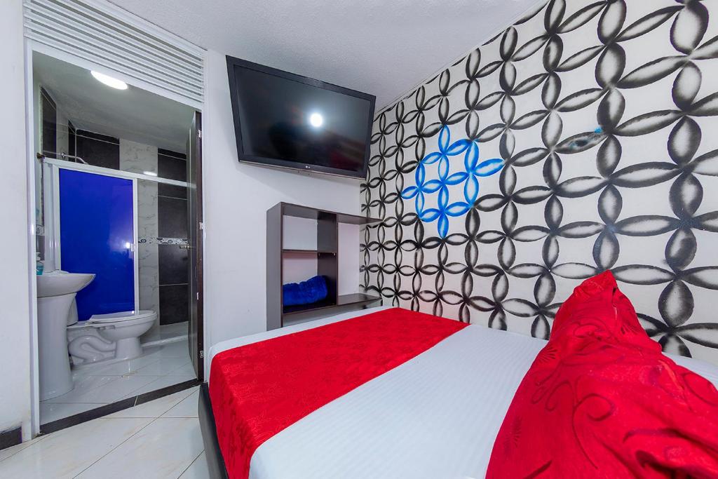 Postel nebo postele na pokoji v ubytování Hotel Confort Obelisk