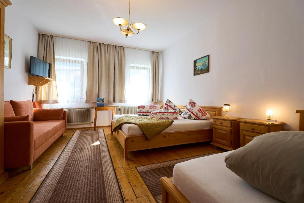 Postel nebo postele na pokoji v ubytování Gasthof Lamm