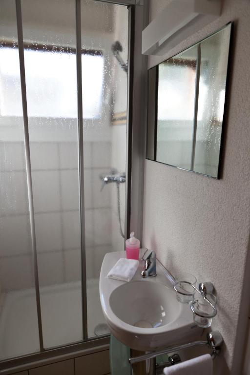 Koupelna v ubytování Hotel Garni Simplon