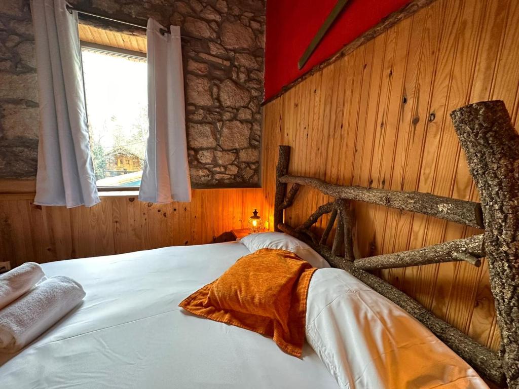 Cama o camas de una habitación en La Posada Cercedilla