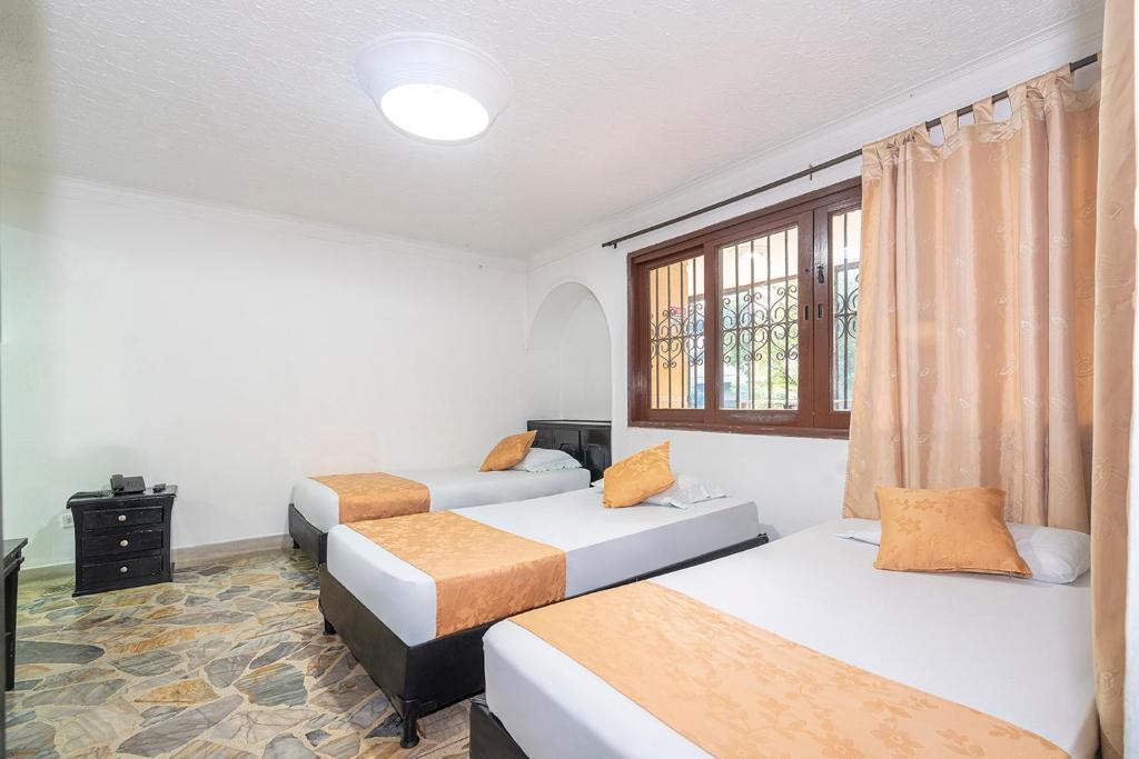 Postel nebo postele na pokoji v ubytování Hotel Barcelona Estadio