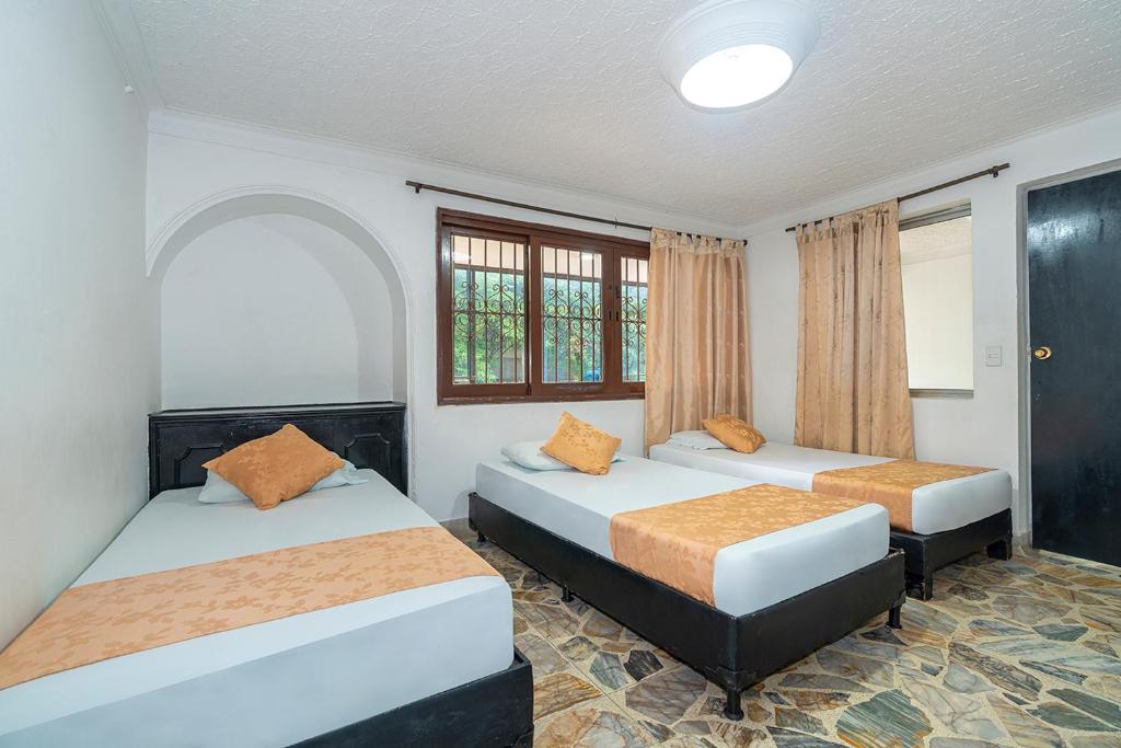 Postel nebo postele na pokoji v ubytování Hotel Barcelona Estadio