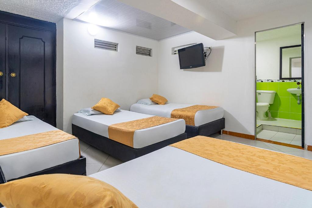 Postel nebo postele na pokoji v ubytování Hotel Barcelona Estadio