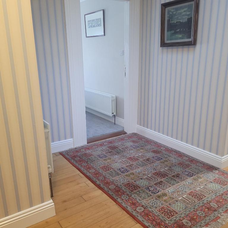 Postel nebo postele na pokoji v ubytování Dun Maeve Guesthouse