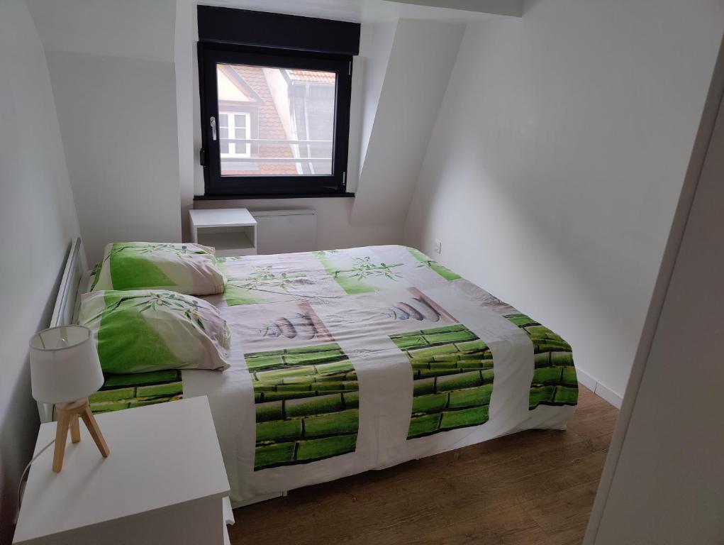 Postel nebo postele na pokoji v ubytování Le Green Duplex moderne en hypercentre