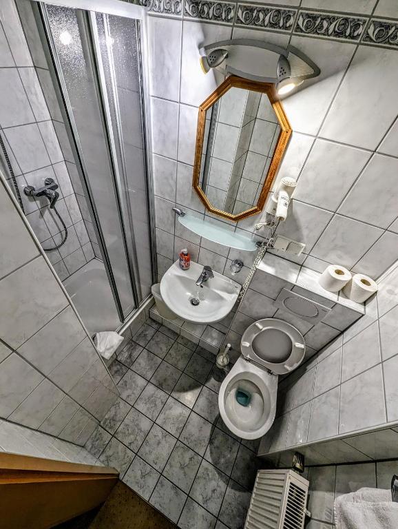 Koupelna v ubytování Hotel am Rathaus