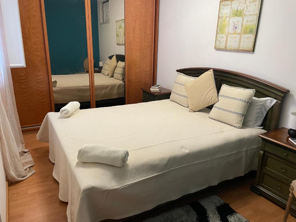 A bed or beds in a room at Casa do Pateo