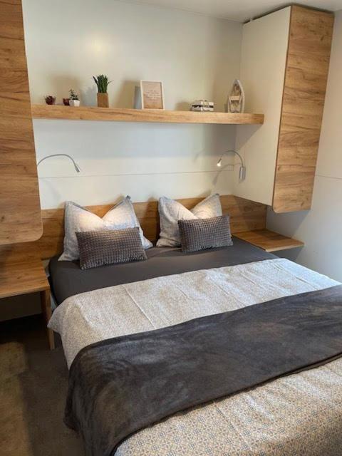 Postel nebo postele na pokoji v ubytování Mobilehome Ive u. Slavka