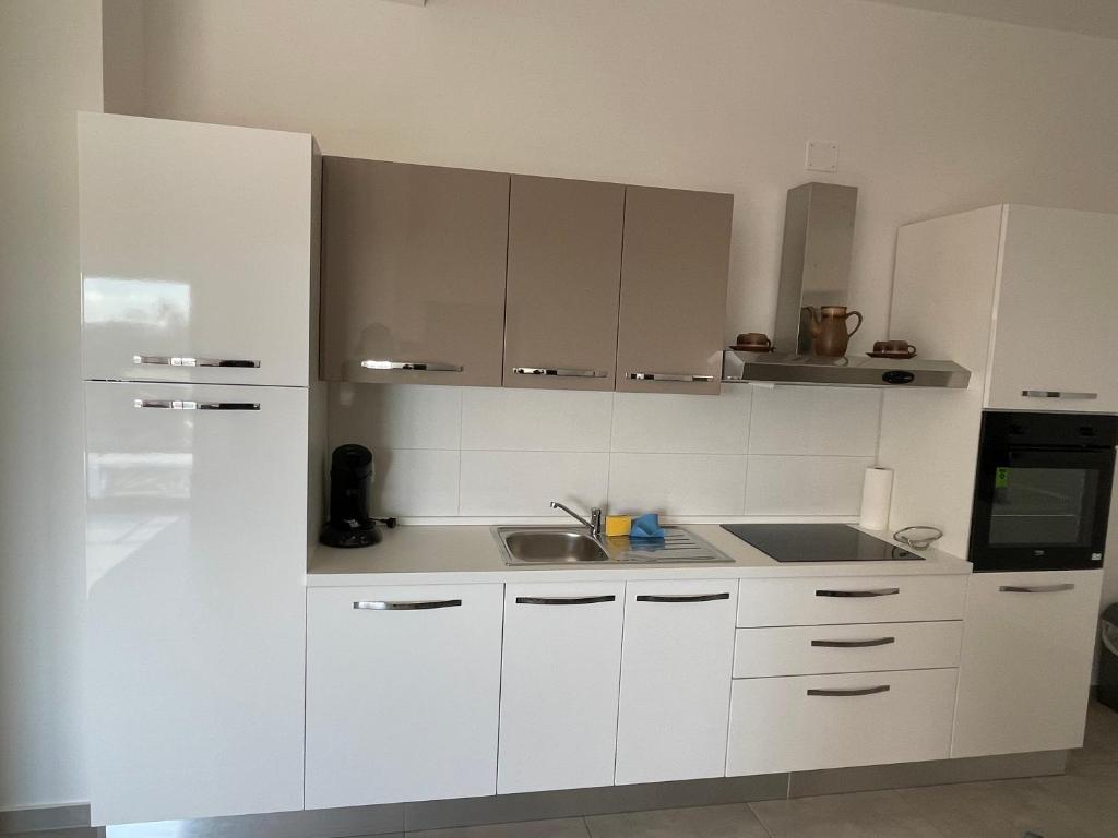 Kuchnia lub aneks kuchenny w obiekcie Apartments Lia-Jolie