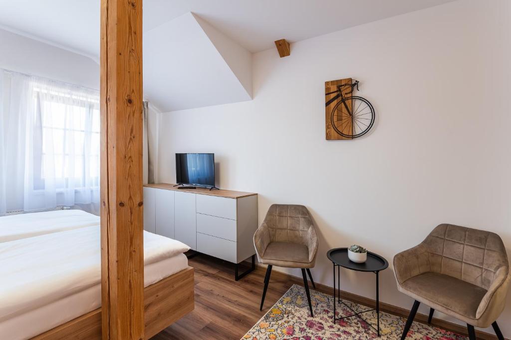 Posteľ alebo postele v izbe v ubytovaní Hotel Restovna