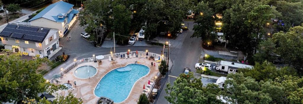 an aerial view of a swimming pool in a parking lot at Sun Outdoors Cape May in Cape May