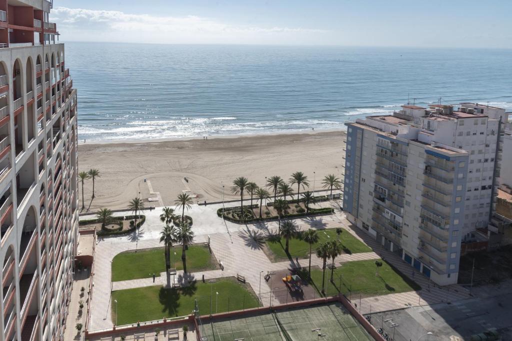 a view of the beach from a building at Ferrobus Duplex in Cullera