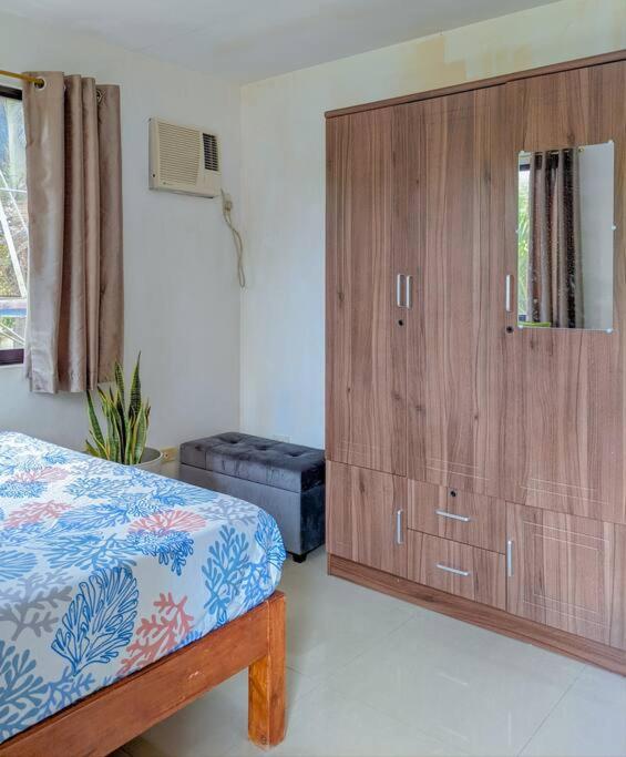 Postel nebo postele na pokoji v ubytování 2BR 2BT home with pool between Tagbilaran and Panglao