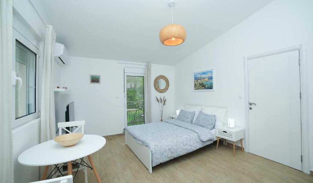 Postel nebo postele na pokoji v ubytování Plamenatz studio apartments