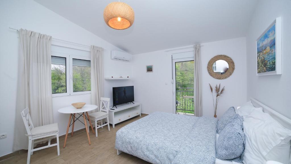 Postel nebo postele na pokoji v ubytování Plamenatz studio apartments