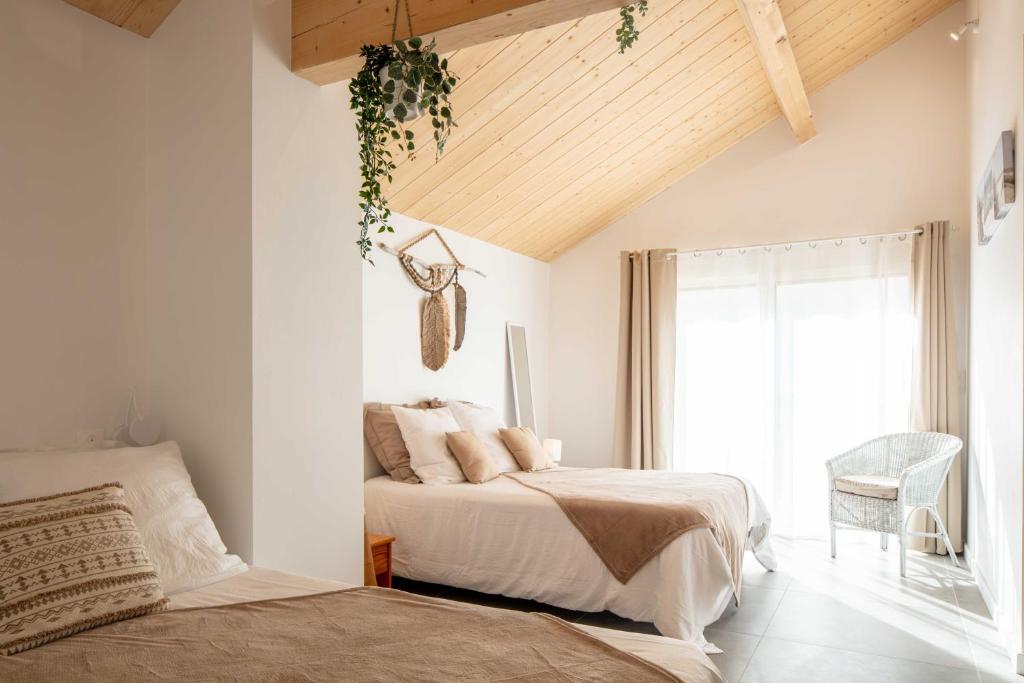Postel nebo postele na pokoji v ubytování Ted Surf House