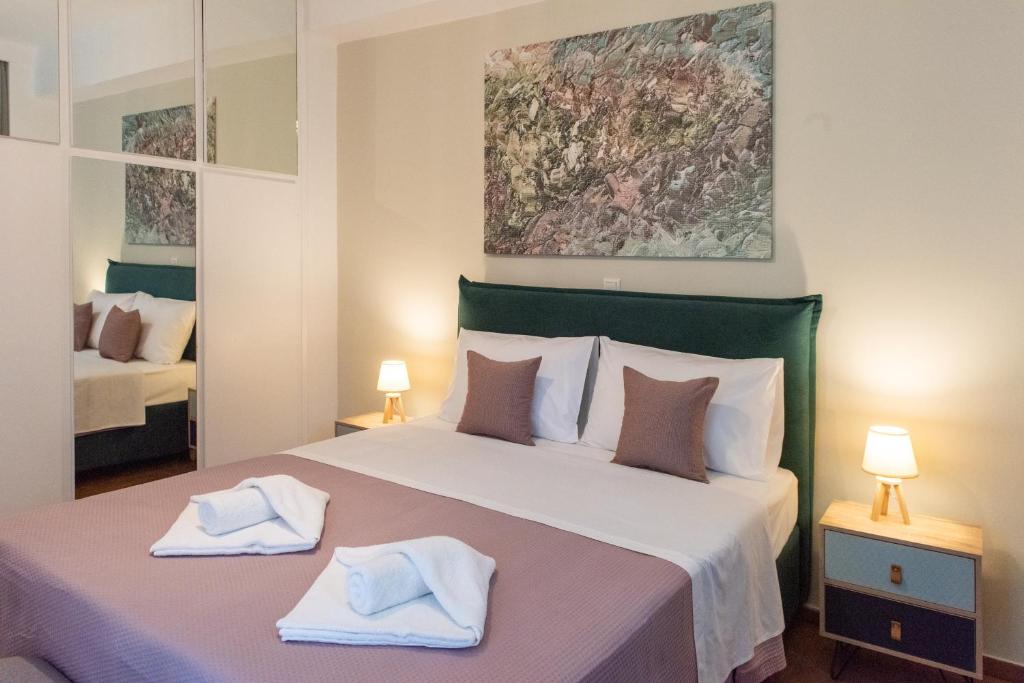 Posteľ alebo postele v izbe v ubytovaní Blue Ark Boho Stay at Acropolis