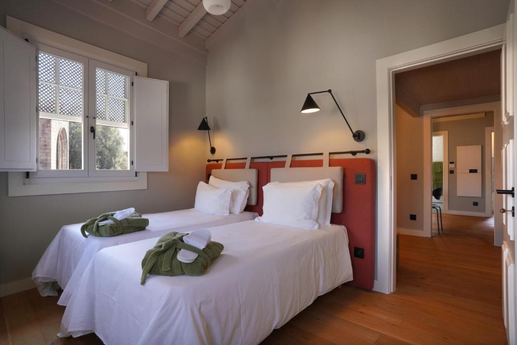 Postel nebo postele na pokoji v ubytování Hotel da Oliveira