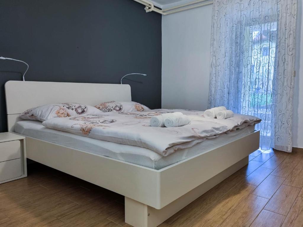 Postel nebo postele na pokoji v ubytování Apartmaji Jakob 1