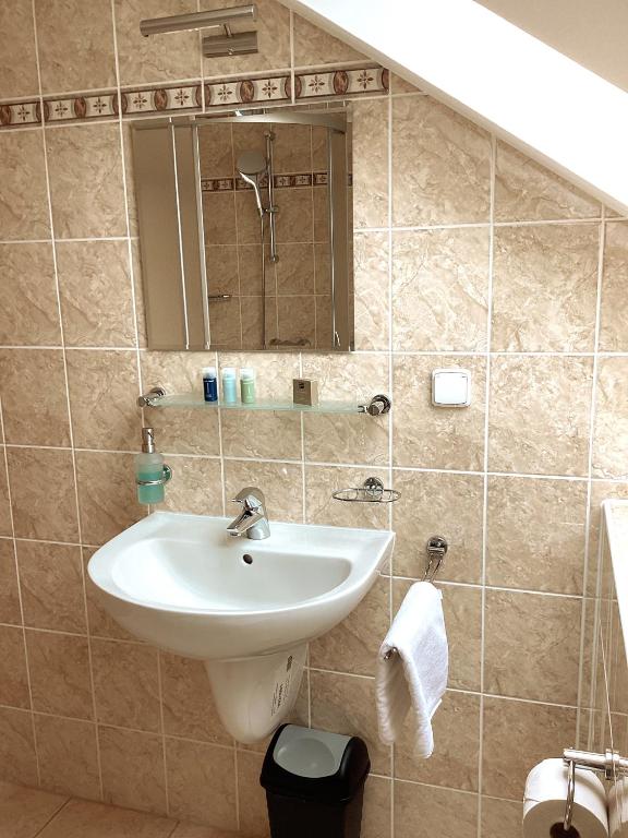 Koupelna v ubytování Hotel Karolina