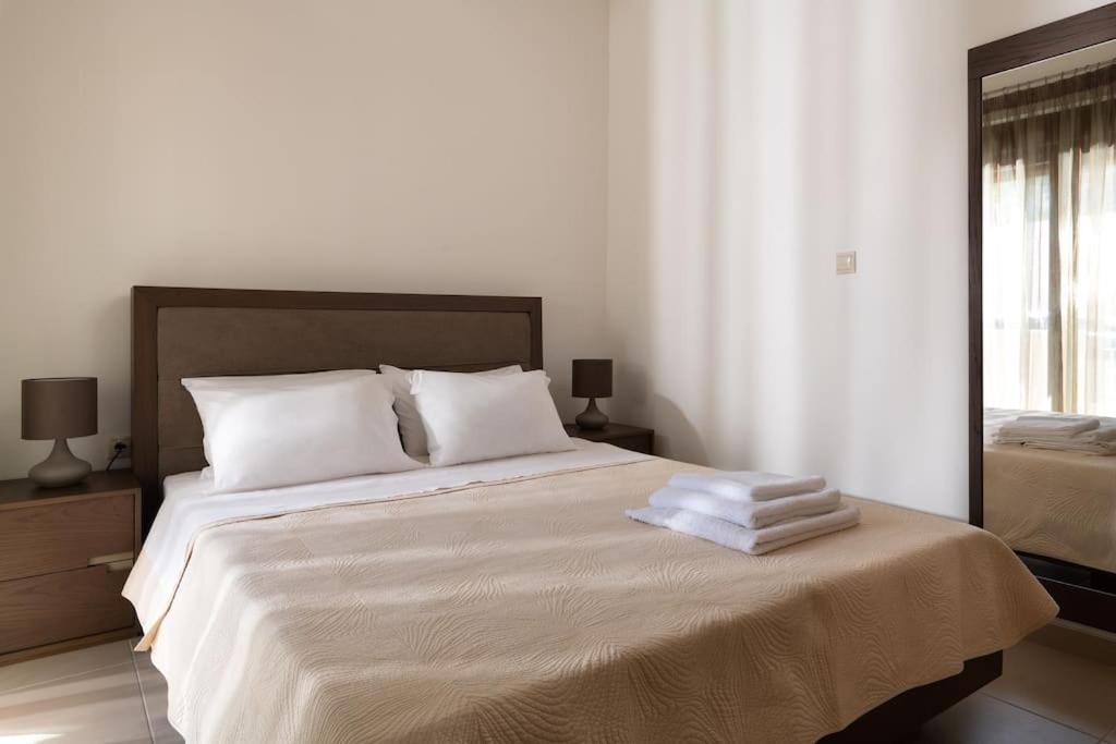 Ένα ή περισσότερα κρεβάτια σε δωμάτιο στο gefiraki apartment
