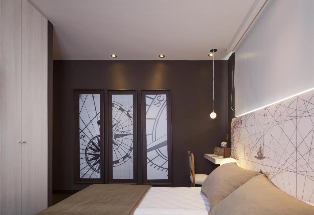 Ambit Boulevard Hotel Boutiqueにあるベッド