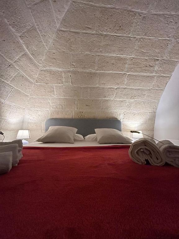 Postel nebo postele na pokoji v ubytování B&B LE CUSPIDI