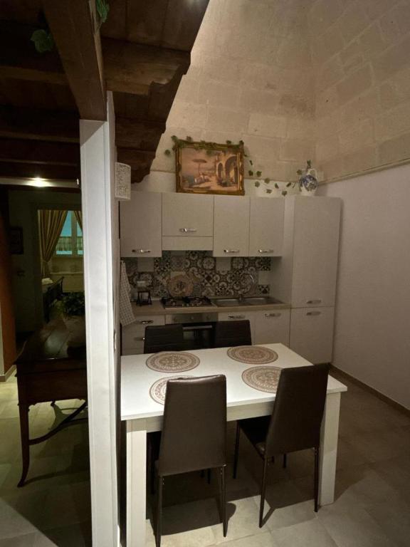 Kuchyň nebo kuchyňský kout v ubytování B&B LE CUSPIDI