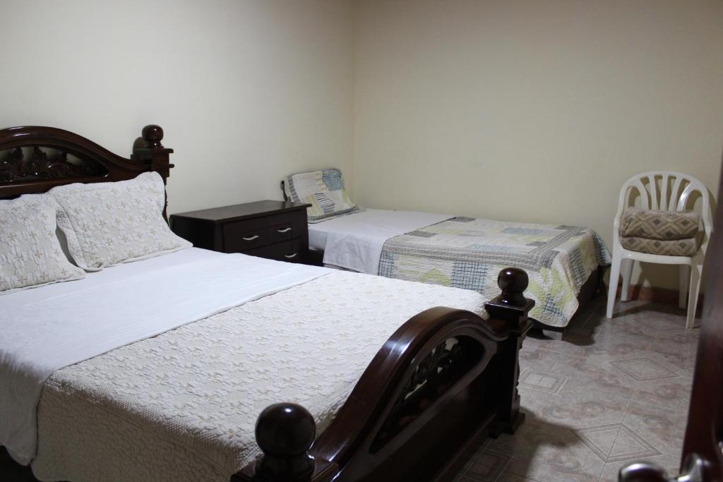 Giường trong phòng chung tại Find Land & a Rest