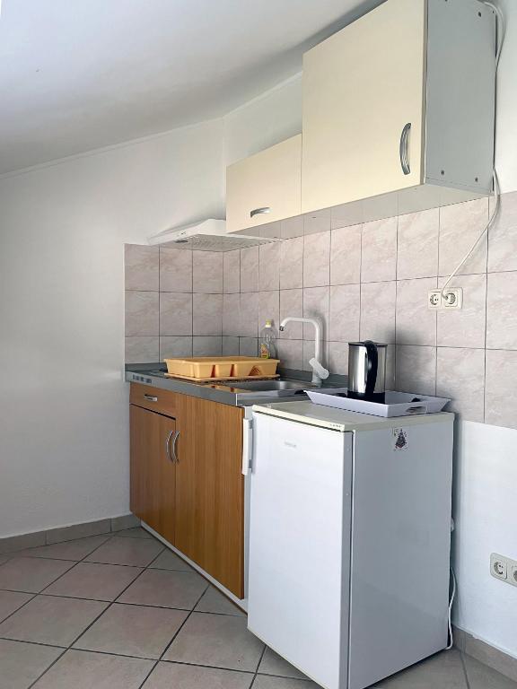 Kuchyň nebo kuchyňský kout v ubytování Apartment Anic
