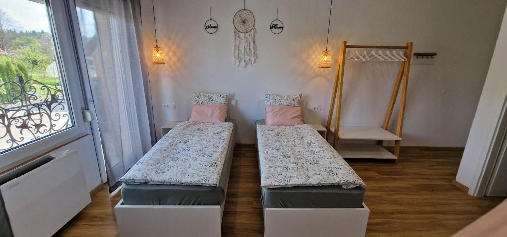 Postel nebo postele na pokoji v ubytování Hotel SAMARIN Črnomelj