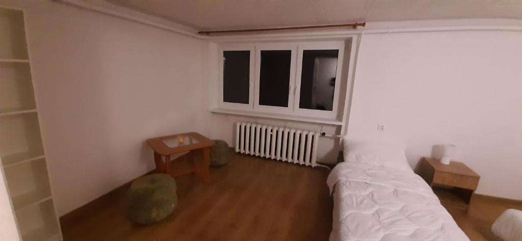 Postel nebo postele na pokoji v ubytování Pokoje Gościnne Kurza Zagroda