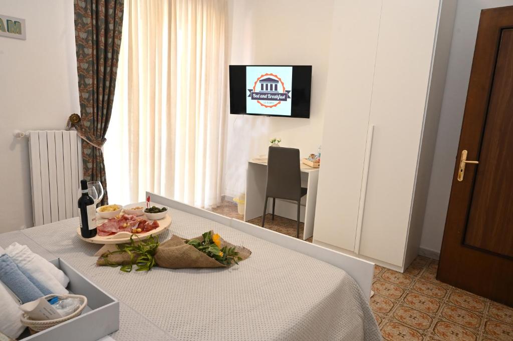TV a/nebo společenská místnost v ubytování B&B Le Corti