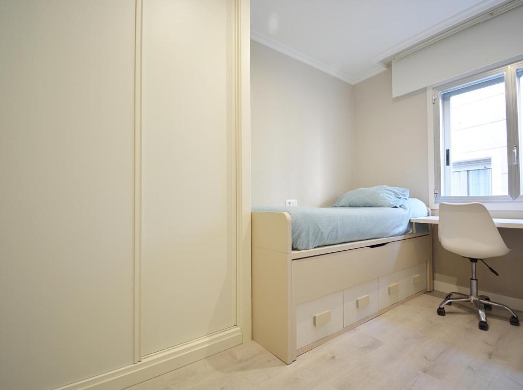 Posteľ alebo postele v izbe v ubytovaní GALIHOST - Apartamento en pleno centro de Portonovo, Sanxenxo
