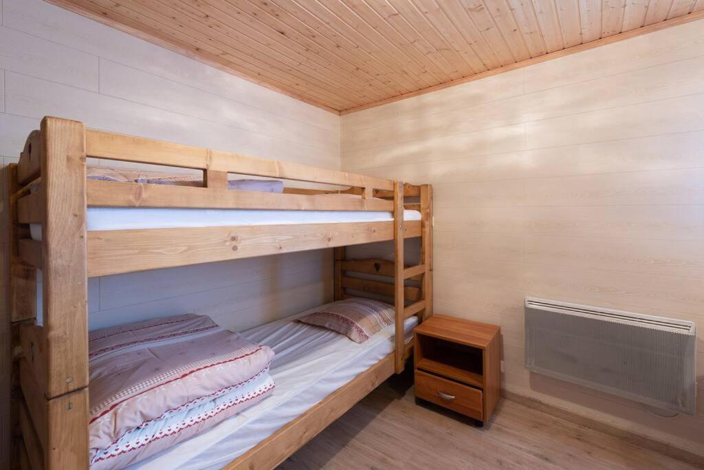 Posteľ alebo postele v izbe v ubytovaní Chalet avec sauna, magnifique vue et à 400m des pistes