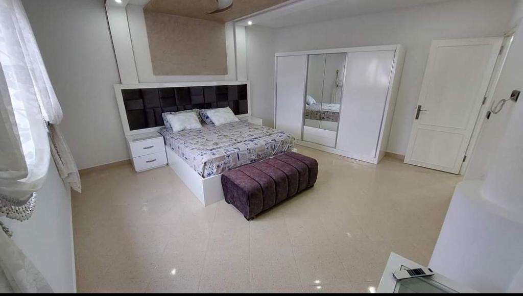 Postel nebo postele na pokoji v ubytování Al Hoceima Ajdir Maroc - Maison 5 chambres 12 personnes