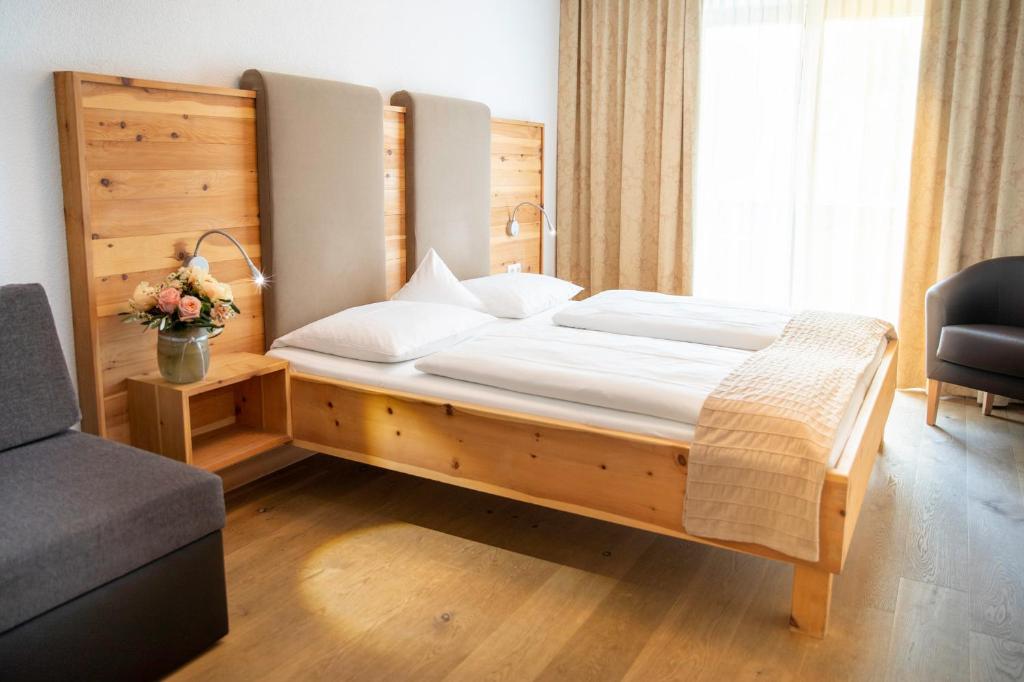 Postel nebo postele na pokoji v ubytování Hotel & Gasthaus Dresch