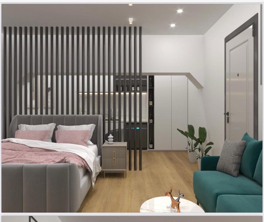 Postel nebo postele na pokoji v ubytování Britney's Apartments