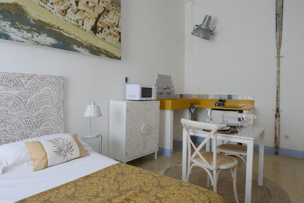 A bed or beds in a room at Home de mar
