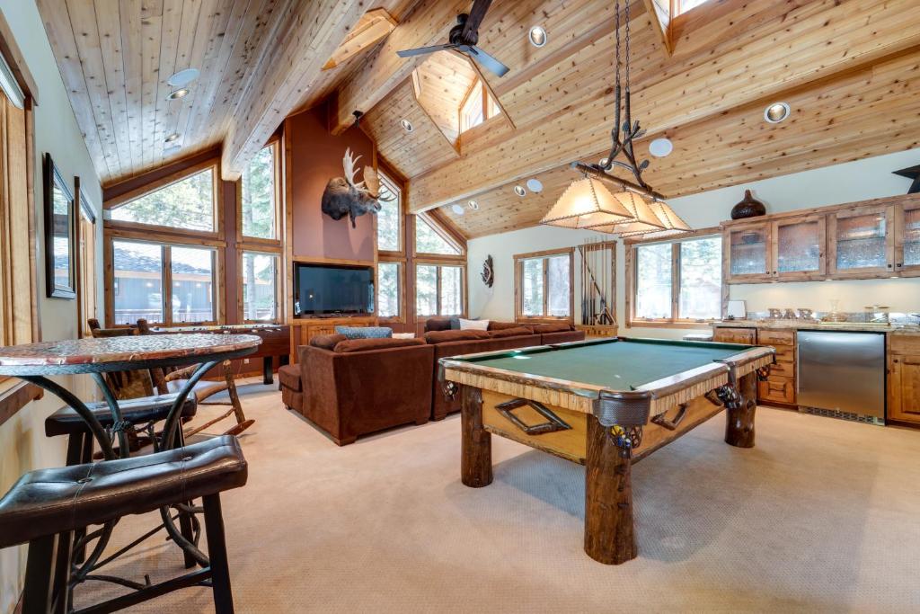a living room with a pool table in it at One Moose Lodge with Hot Tub in Tahoe Donner in Truckee