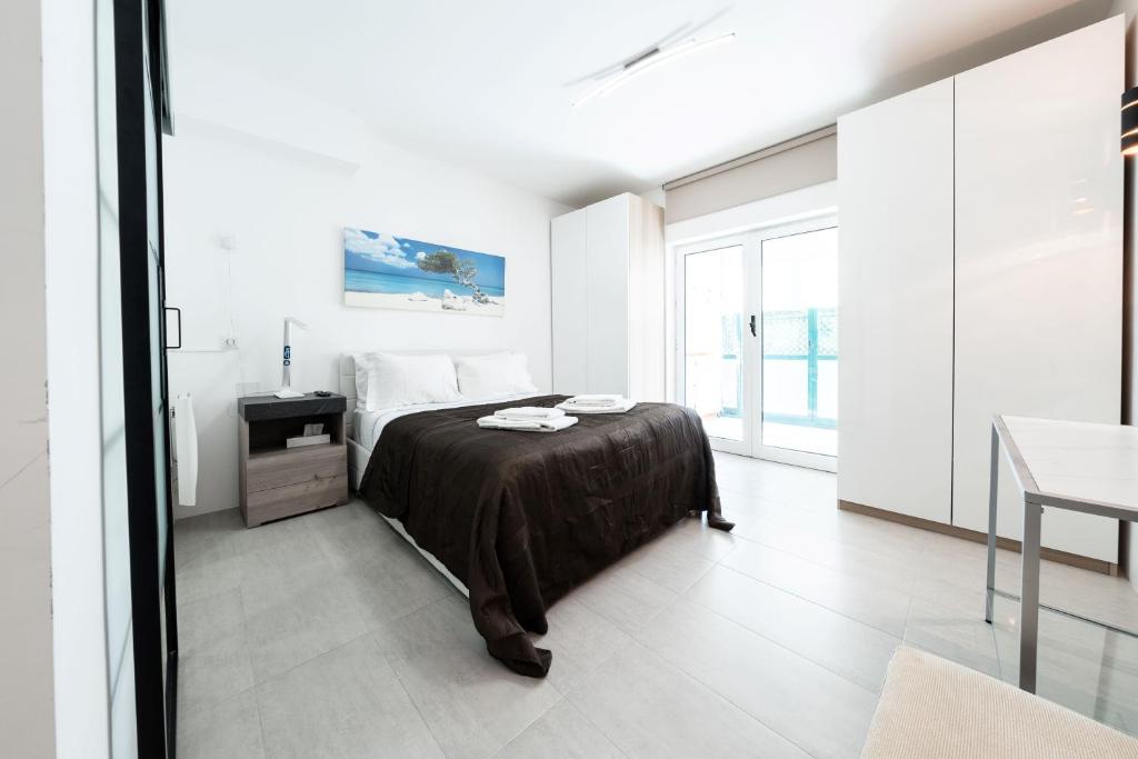 Postel nebo postele na pokoji v ubytování Luxury Apartment near Cascais Town & Marina