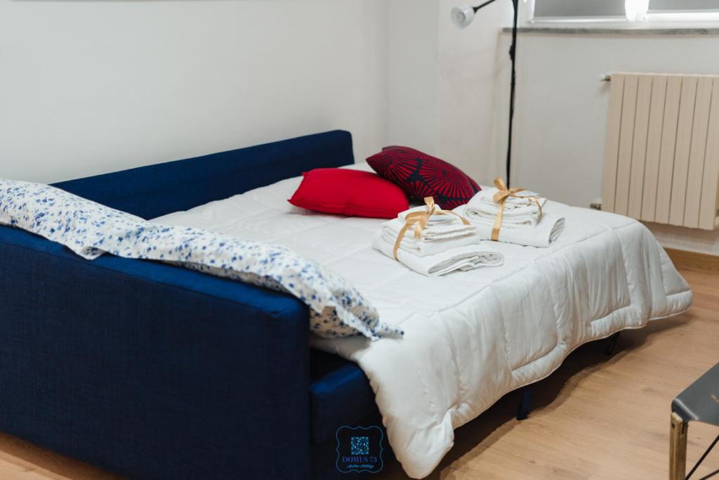 A bed or beds in a room at DOMUS 73 Apulian holidays