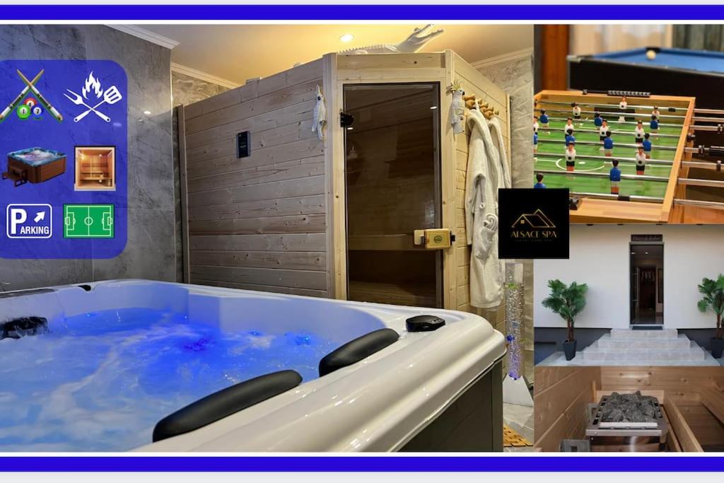 eine große Badewanne mit blauem Wasser in einem Zimmer in der Unterkunft Maison privative SPA Jacuzzi Sauna Salle de jeux in Weitbruch