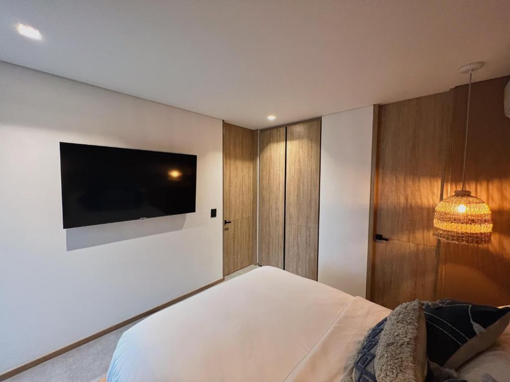 Postel nebo postele na pokoji v ubytování Wake Living