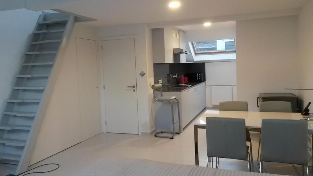 Kuchyň nebo kuchyňský kout v ubytování Aparthotel Midi Residence