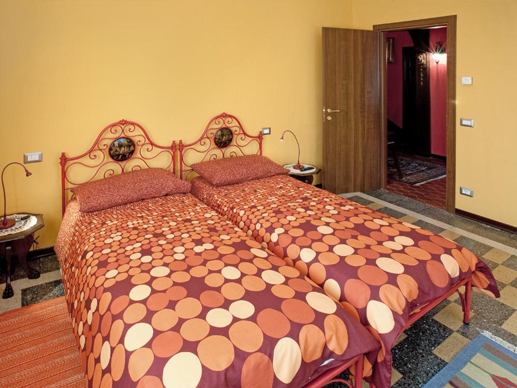 Posteľ alebo postele v izbe v ubytovaní Le Coccinelle B&B