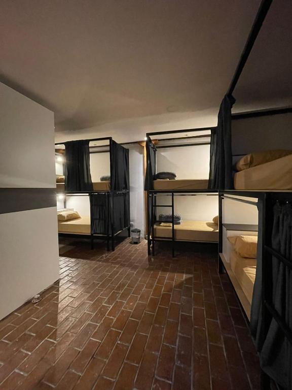 Postel nebo postele na pokoji v ubytování Ñañas Hostel