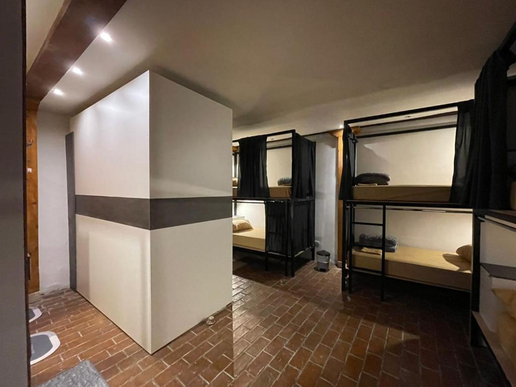 Postel nebo postele na pokoji v ubytování Ñañas Hostel